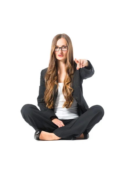 Young self confident business woman pointing — Stock Photo, Image