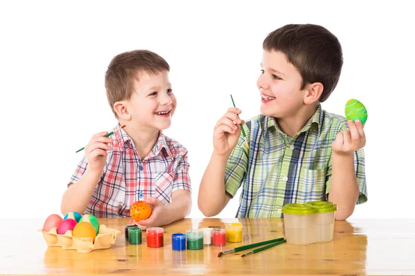 Two boys painting easter eggs — Stock Photo, Image