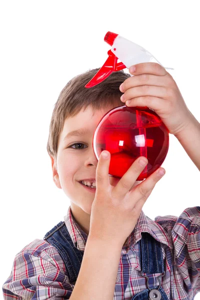 Chlapec s červenými rozprašovač v rukou — Stock fotografie