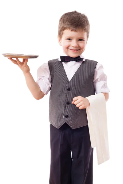 Маленький официант с подносом и полотенцем — стоковое фото