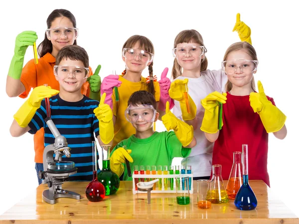 Kids holding chemical test-tubes — Stock Photo, Image