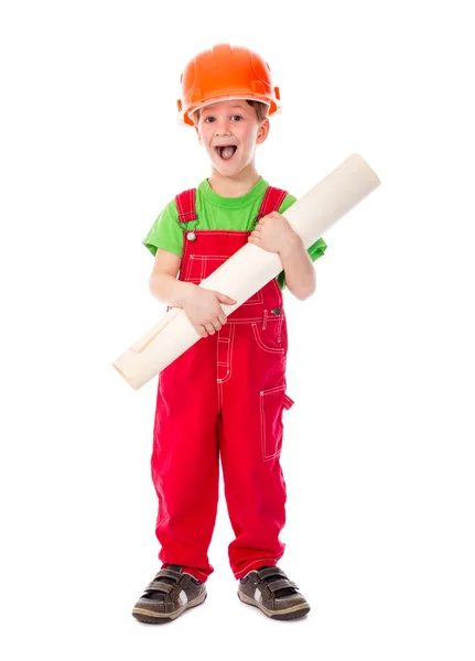 Little builder standing with paper plan in hands — Stock Photo, Image