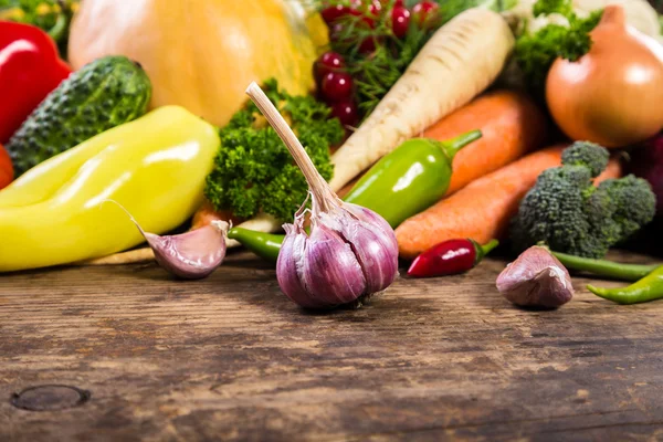 Vegetables on wooden table — Stock Photo, Image