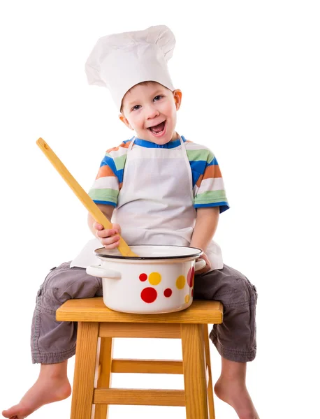 Kleine Köchin mit Schöpfkelle und Pfanne — Stockfoto