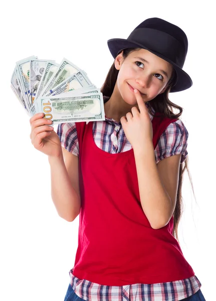 Träumendes Mädchen mit Geld in der Hand — Stockfoto