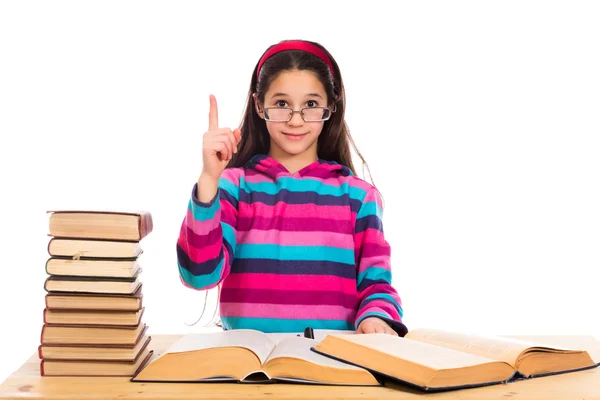 Fille avec pile de vieux livres — Photo