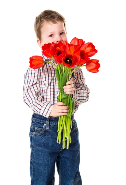 Chłopiec z bukietem tulipanów — Zdjęcie stockowe