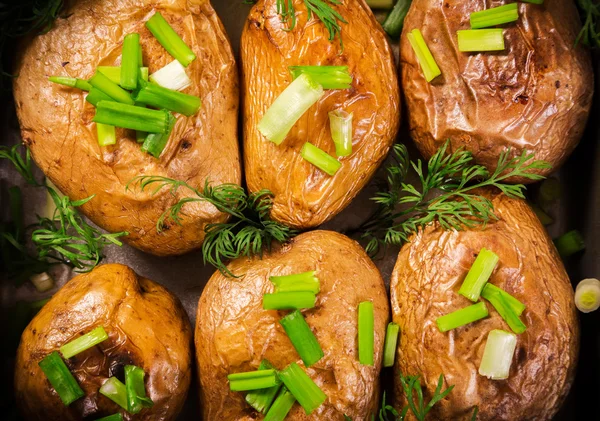 Baked potatoes with onion — Stock Photo, Image