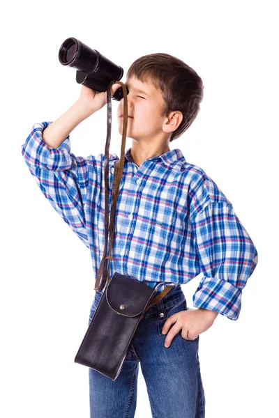 Boy looking to spyglass — Stock Photo, Image