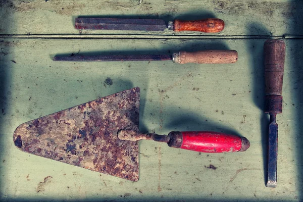 Old dirty tools on table — Stock Photo, Image