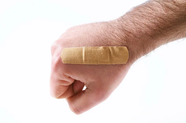 Male hand with the band aid — Stock Photo, Image