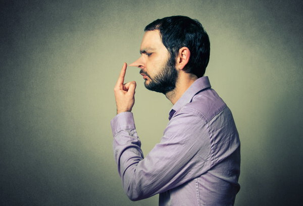 man with the big nose, lie concept
