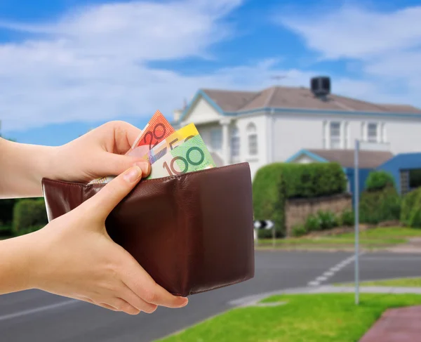 Australian money in wallet on real estate background — Stock Photo, Image