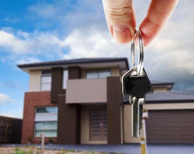 key in hand with real estate clipart