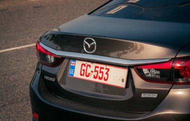 Batum. Gürcistan - 27 Ekim 2020: Mazda hibrit araba Batumi sokaklarında
