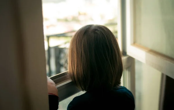 Little Girl Looking Out Window — Stock Photo, Image