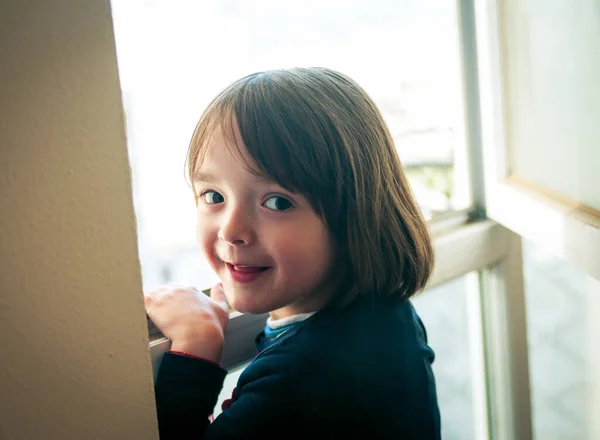 Little Girl Looking Out Window — Stock Photo, Image