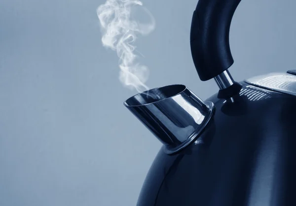 Kettle Boiling On A Gas Stove In The Kitchen. Focus On A Spout Stock Photo,  Picture and Royalty Free Image. Image 43166984.