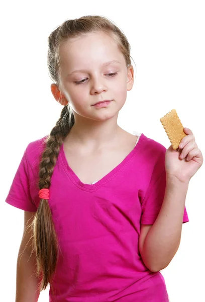 Menina com biscoito — Fotografia de Stock