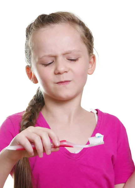 Menina com escova de dentes — Fotografia de Stock