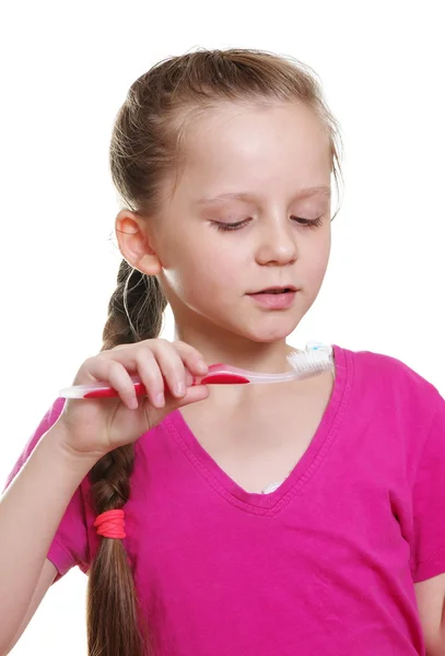 Chica con cepillo de dientes — Foto de Stock