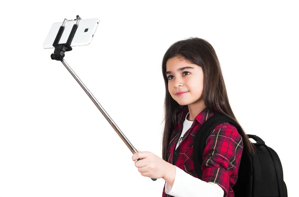 Pretty school girl doing selfie — Stock Photo, Image