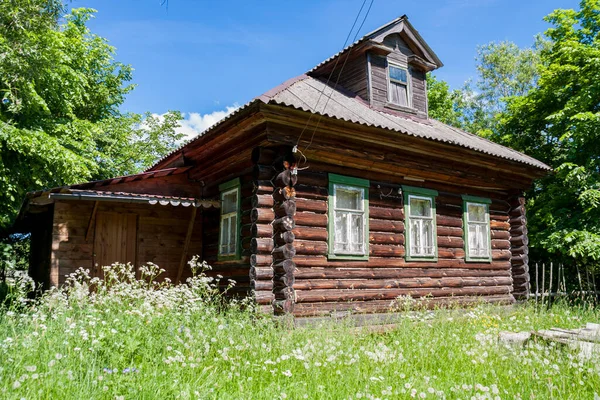 Old abandoned rustic log house Stock Photo