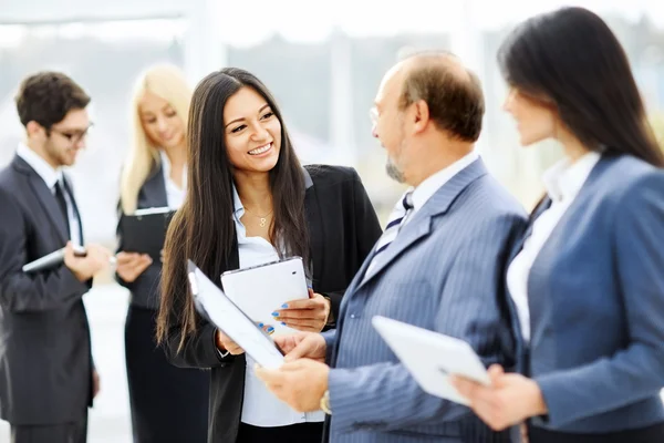 Meeting business partners before presentation in the lobby — Stock Photo, Image