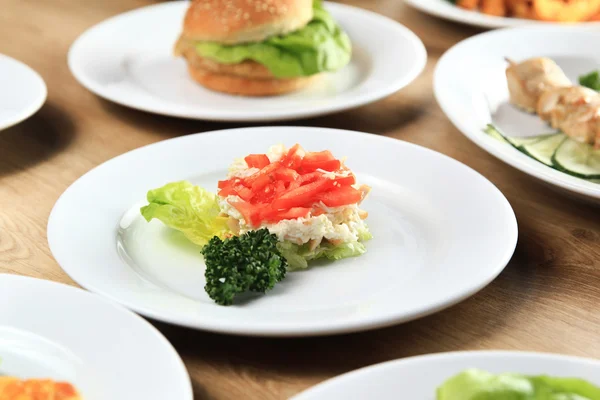 Host of delicious dishes on the table in the children's  restaurant — Stock Photo, Image