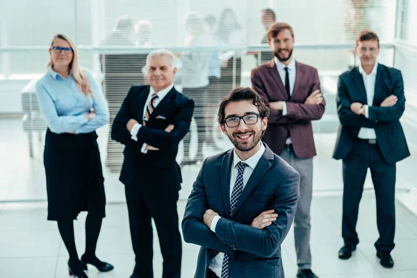 Group of successful business people standing in the office — Stock Photo, Image