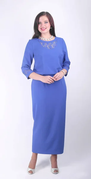 In volle groei. elegant vrouw model in blauw pak — Stockfoto