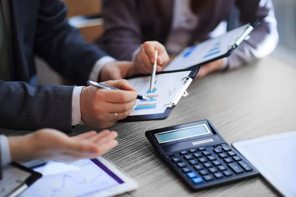 Close up. business colleagues discussing financial documents. — Stock Photo, Image