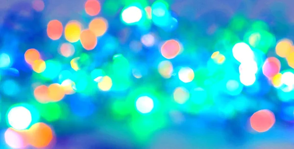 Fondo festivo de luces brillantes coloridas borrosas. — Foto de Stock