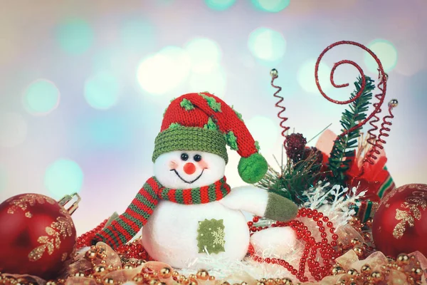 Cheerful snowman and Christmas toys on white background. — Stock Photo, Image