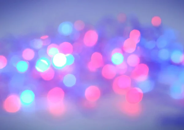 Festive background of blurred colorful bright lights. — Stock Photo, Image