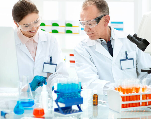 close up. scientists work in the laboratory for blood research.