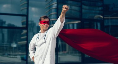 confident doctor in a superhero Cape is ready for feats. clipart