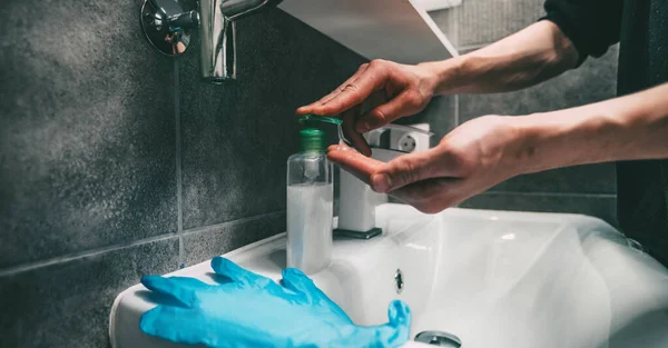 Close up. casual man washes his hands thoroughly after a walk . — Stock Photo, Image