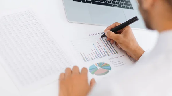 Business man analyzing financial data . rear view. — Stock Photo, Image