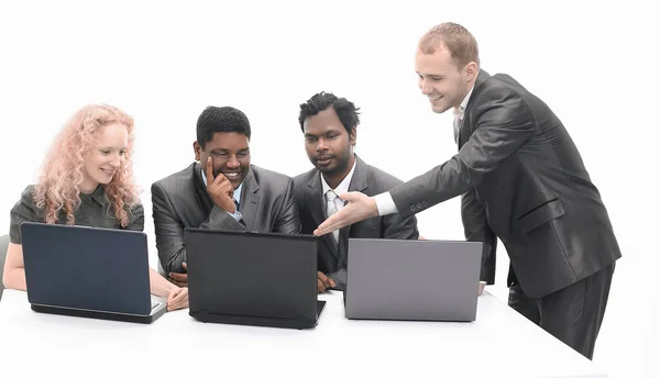 Successful business team discussing the information with the la — Stock Photo, Image