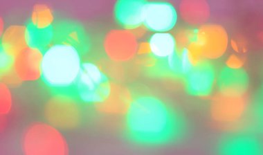 Bulanık parlak ışıkların neşeli arka planı.
