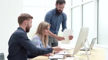 Manager leaves documents to employees for further work.