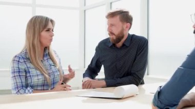 working group discussing important issues at an office meeting.