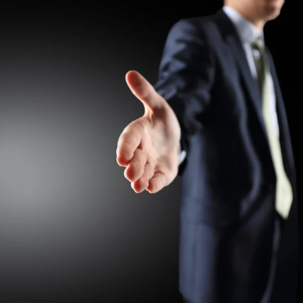 A business man with an open hand ready to seal a deal — Stock Photo, Image