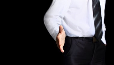 İşi bağlamaya hazır eli açık bir iş adamı.