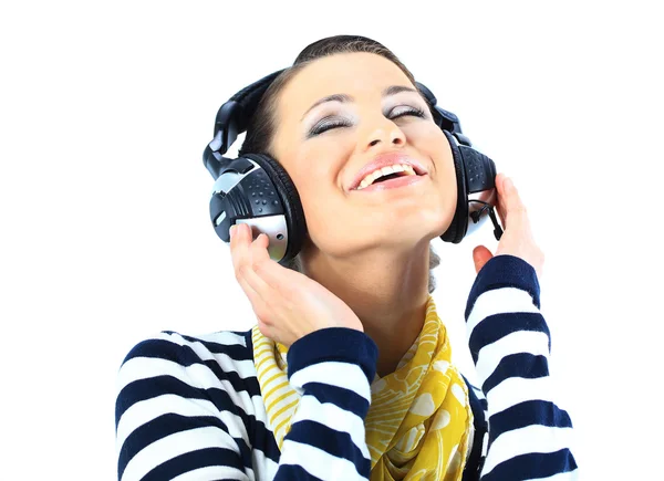 Hermosa chica con auriculares. Aislado sobre un fondo blanco —  Fotos de Stock