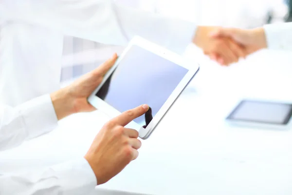 Business associates shaking hands in office — Stock Photo, Image