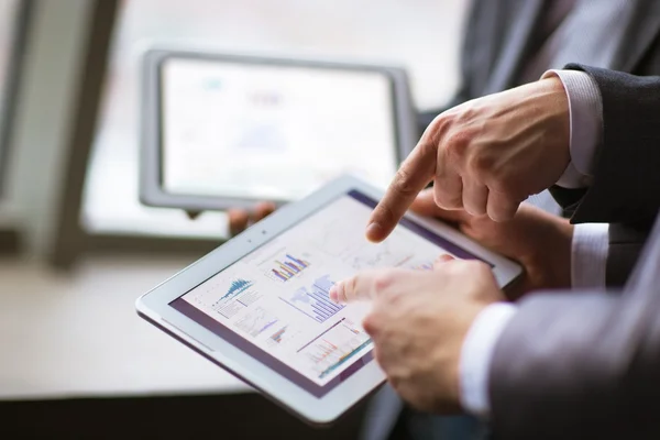 Hands of people working with tablet computer. — Stock Photo, Image