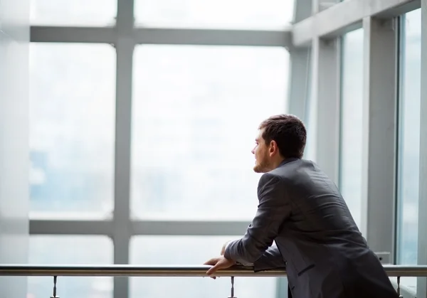 Portrait of a handsome business man in the office — Stock Photo, Image