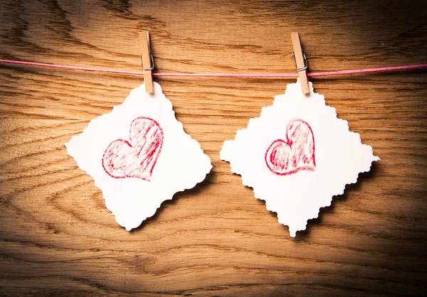 Piros szív üzenet kártyát, és piros szív. Valentin-nap képe. — Stock Fotó